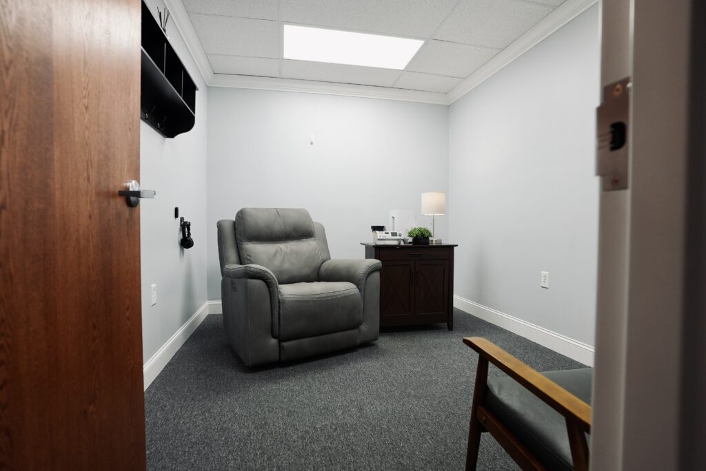 Comfortable private treatment room used to address common ketamine therapy myths